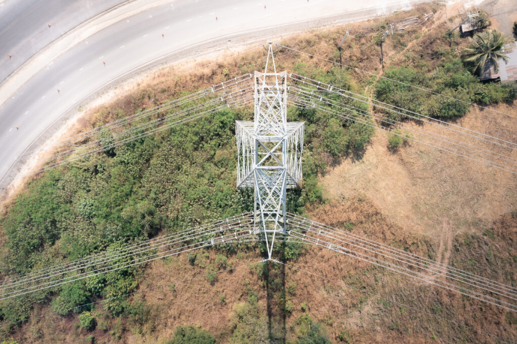 Transmission tower or pylon in aerial view.