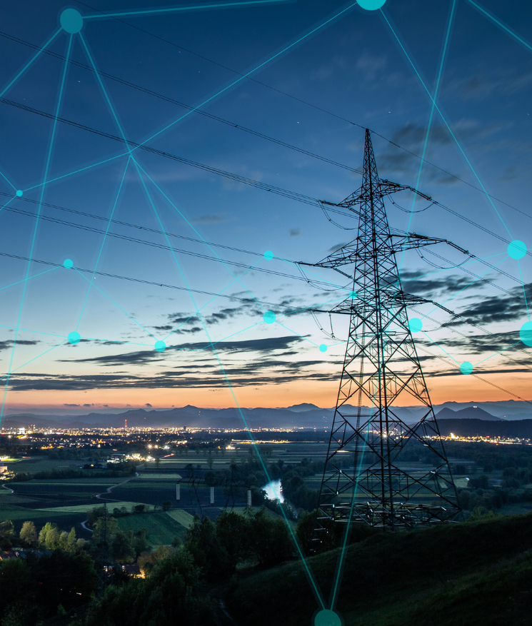 Transmission tower at sunset with overlaid connected graphic.